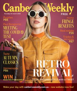 A blonde model holding a handbag wearing a camel brown dress and white sunglasses. Front cover of the Canberra Weekly.